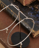 Orecchini cerchio grande diamantato in acciaio - Chiave cuore