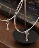 Orecchini cerchio grande diamantato in acciaio - Chiave fiore gotico