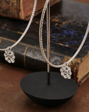 Orecchini cerchio grande diamantato in acciaio - Fiore gotico