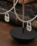 Orecchini cerchio grande diamantato in acciaio - Lucchetto