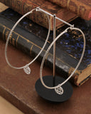 Orecchini cerchio grande diamantato in acciaio - Rosone