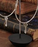 Orecchini cerchio medio diamantato in acciaio - Chiave cuore