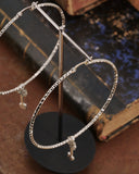 Orecchini cerchio medio diamantato in acciaio - Chiave fiore gotico