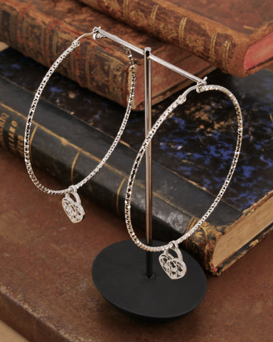 Orecchini cerchio medio diamantato in acciaio - Lucchetto cuore traforato