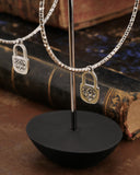 Orecchini cerchio medio diamantato in acciaio - Lucchetto