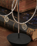 Orecchini cerchio medio diamantato in acciaio - Rosone