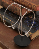 Orecchini cerchio medio diamantato in acciaio - Cuore