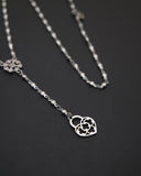 Collana stile rosario in acciaio - Fiore gotico e lucchetto cuore traforato